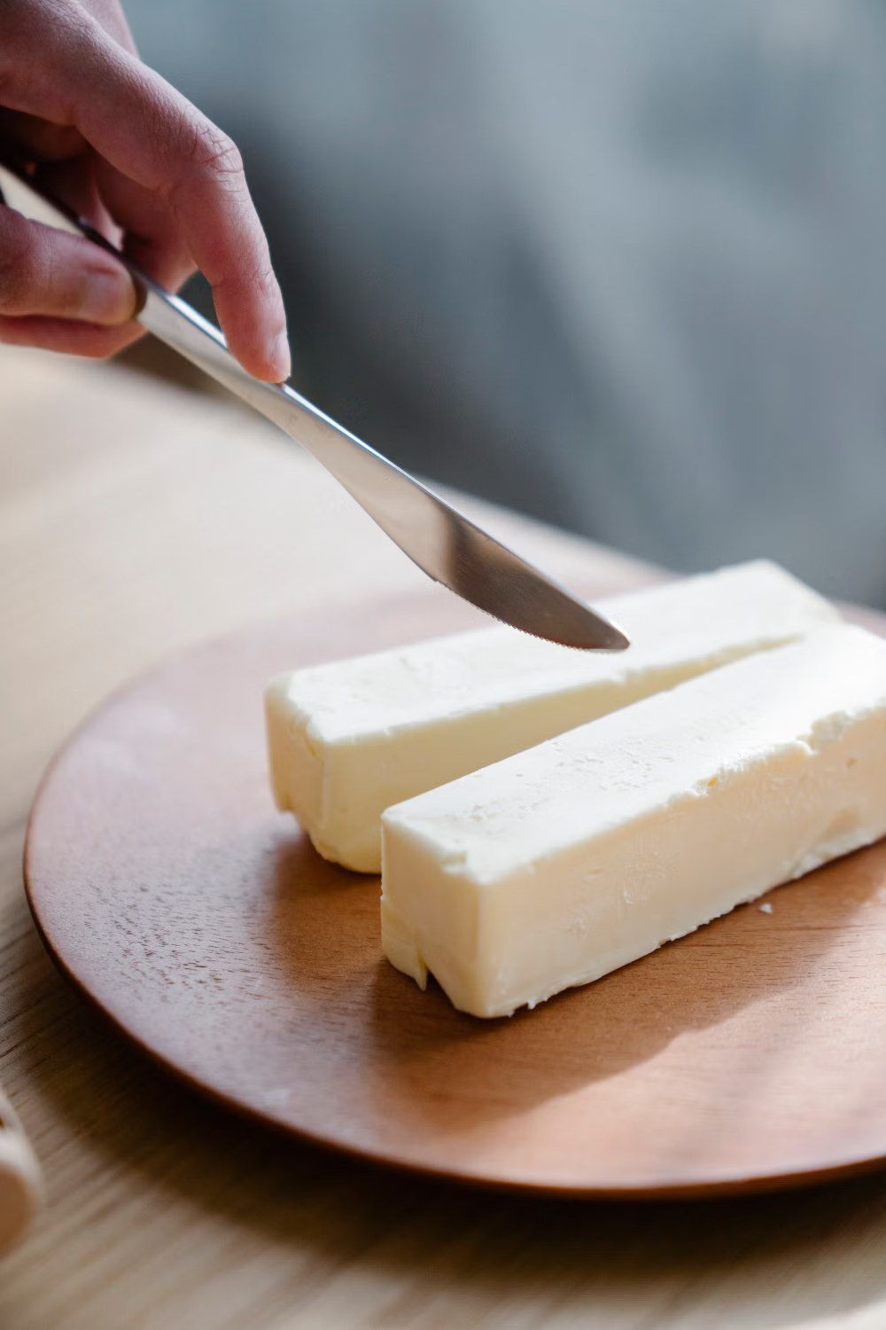 Butter on a wooden plate